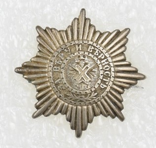 Миниатюра в виде звезды Андрея Первозванного на булавке.